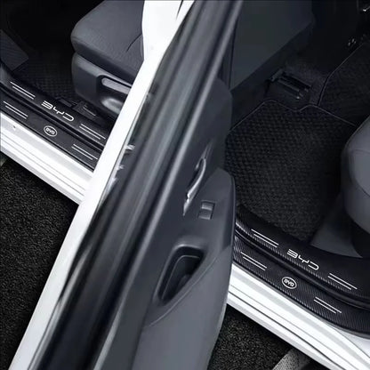 حماية عتبات الأبواب بنقشة الكاربون لـ BYD