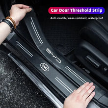 حماية عتبات الأبواب بنقشة الكاربون لـ BYD